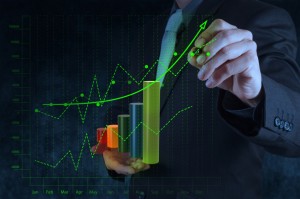 businessman hand drawing virtual chart business on touch screen